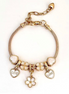 Gold Bracelet with clover, flowers and heart shape charms