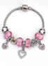 Silver Bracelet with pink crystal bead, 3 heart shape charms