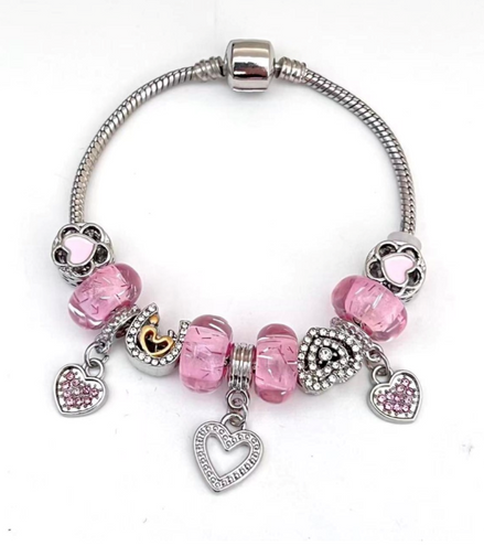 Silver Bracelet with pink crystal bead, 3 heart shape charms