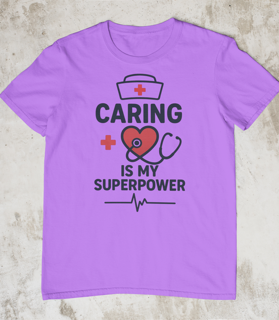 Purple t-shirt with 'Caring is my Superpower' design on a concrete surface