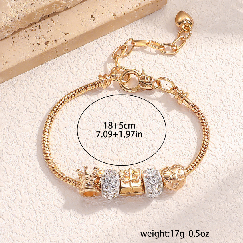 Gold Bracelet with crown and sparkling charms