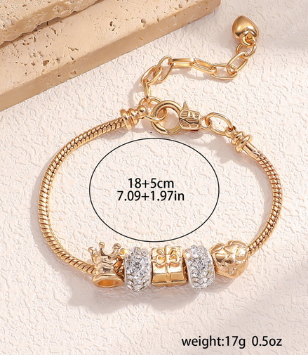Gold Bracelet with crown and sparkling charms