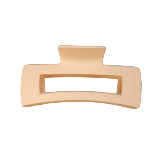 Beige hair clip on a white background