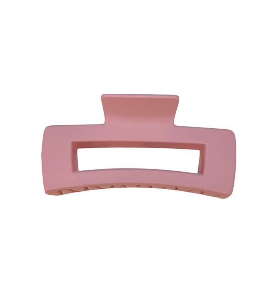 Pink hair clip on a white background