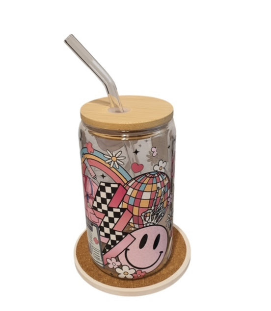 Colorful tumbler with a lid and straw on a white background