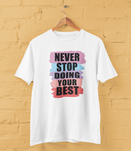 White t-shirt with motivational quote on a yellow brick wall background