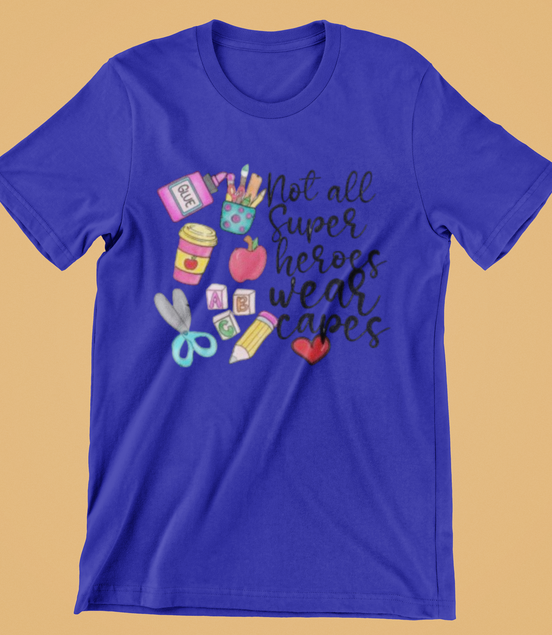 Blue t-shirt with educational-themed graphics and text on a beige background
