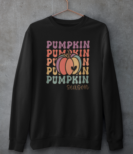 Black sweatshirt with 'Pumpkin Season' text and pumpkins on a gray background