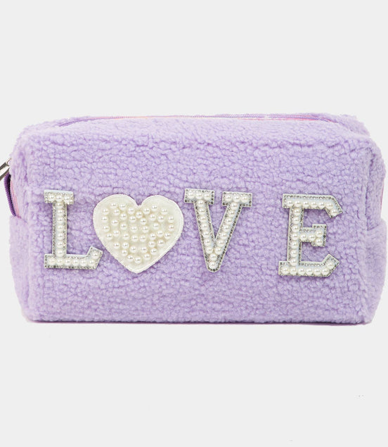 Purple pouch with 'LOVE' text and heart design on a white background