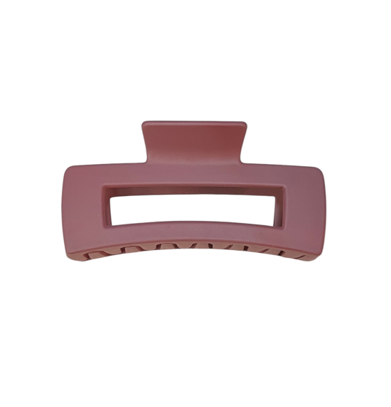 Pink hair clip on a white background