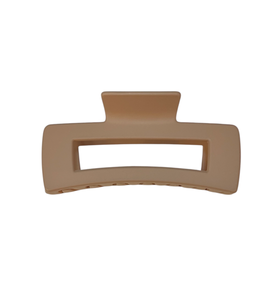 Beige hair clip on a white background